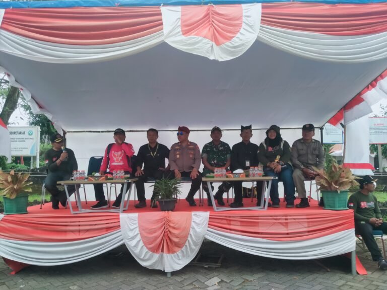 Koramil 0825/20 Songgon Dukung Kegiatan Gerak Jalan Tingkat SD/MI Sebagai Upaya Membangun Generasi Muda Yang Priduktif
